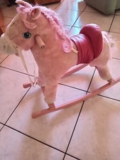 Cavalluccio a dondolo rosa in buone condizioni 