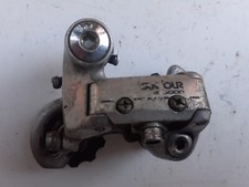 Deragliatore posteriore marcato SUNTOUR per bici  corsa  e/o sport d'epoca