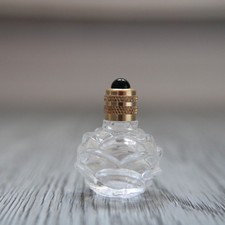 Miniature de parfum vide, bouteille en verre de forme rose, couleur noir