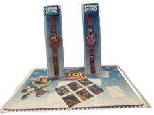 WALT DISNEY lotto due OROLOGI vintage Cartoon Studio by ZEON + Tavola TOY STORY