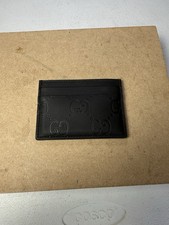 Autentica custodia porta carte Gucci GG effetto gomma nero opaco prezzo consigliato: $330