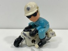 RARO giocattolo vintage anni 80 avvolgibile poliziotto traffico motociclista