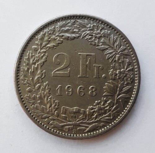 Moneta svizzera franchi - svizzera, anno