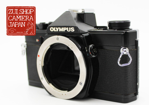 Ecc olympus om 1 - +,
