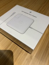 Caricabatteria/adattatore di