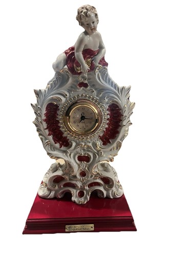 Orologio scultura porcellana