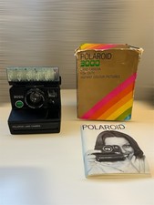 Polaroid 3000 SX-70 con flash