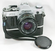 Canon AT-1 fotocamera reflex pellicola + obiettivo Canon FD 50 mm F1.8 + avvolgitore Canon A 256405