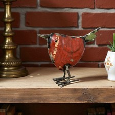 Statua uccellino rosso rustica