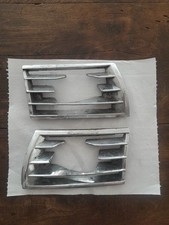 Pair of chrome grilles fog