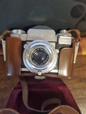 Zeiss-Ikon Contaflex IV con Synchro-Compur Tessar 1:2,8 T 50 mm custodia + LIBRO