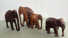 FAMIGLIA DI 4 ELEFANTI AFRICANI IN LEGNO INTAGLIATO VINTAGE