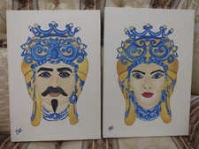 Coppia quadri ceramica teste