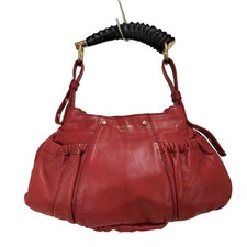 Borsa a tracolla Yves Saint Laurent Mombasa in pelle rossa vintage danneggiata
