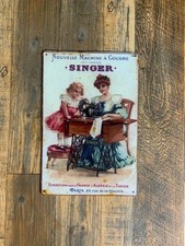 Insegna in metallo, Singer