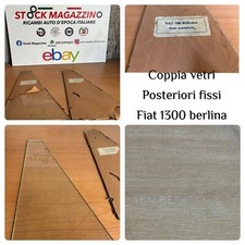 pair of fixed rear windows