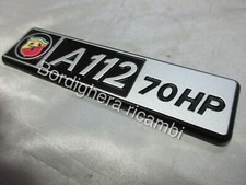 AUTOBIANCHI A 112 A112 ABARTH 70HP SIGLA SCRITTA STEMMA LOGO BADGE COFANO NUOVO