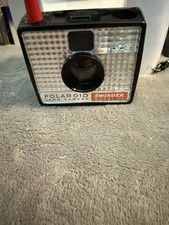 Macchina fotografica terrestre Polaroid Swinger modello 20.  Vintage.   Buone condizioni