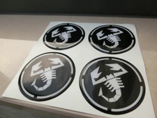 COPRIMOZZI ADESIVO STICKERS PER CERCHI IN LEGA 3D X4 PZ 55 mm ABARTH NERO 500