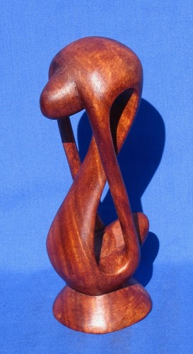 Coppia astratta intagliata - , a