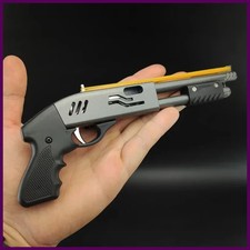 Mini pistola de juguete con