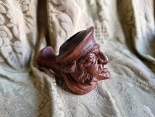 Antica pipa in legno intagliato