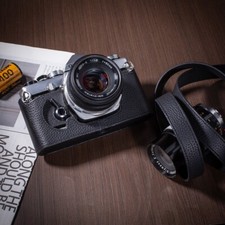 Custodia mezza fotocamera in