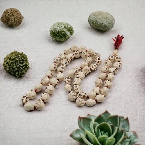 Cranio mala intagliato a - mala,