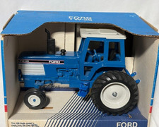 Modelli in scala 1989 prima edizione trattore Ford TW-25, blu, 1/16