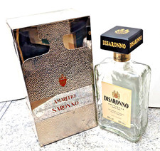 Amaretto di Saronno scatola pubblicitaria in metallo e bottiglia vintage