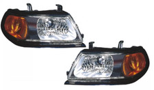2 X FARO FANALE PROIETTORE ANTERIORE PER MITSUBISHI PAJERO SPORT H4 CORNICE NERA