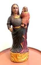 madonna antica statua