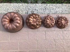 CUCINA LOTTO DI 4 ANTICHI STAMPI PER BUDINO (DIAMETRO 25-20-17 CM. CIRCA)