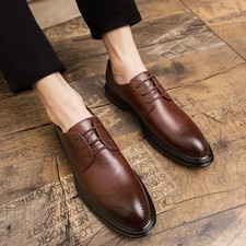 Scarpe uomo intagliate