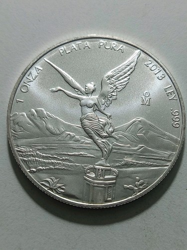Oncia onza plata pura - 1,