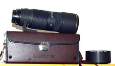 Tokina AT-X AF 100-300 f/4 internal focus per Nikon
