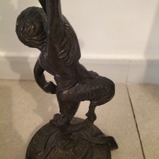 Candelabro antico in bronzo