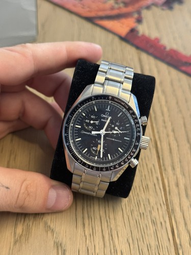 Omega swatch moonwatch - omega,