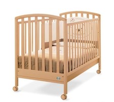 Pali lettino con sponde in legno naturale. Ruote con freno. Usato in ottimo stat