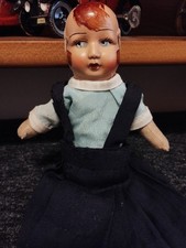 Bambola in bachelite e stoffa epoca 1920 testina applicata condizioni ottime