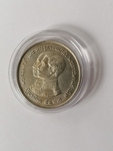 Moneta thailandese baht in - 50,