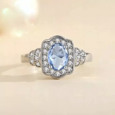 ANELLO ENGAGEMENT IN ORO BIANCO 18 KT. TIT. 750 CON ACQUAMARINA E BRILLANTI.