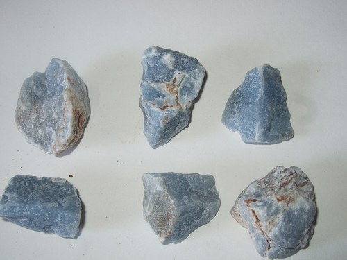 Minerali grezzi - -,