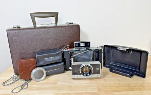 Polaroid 195 land - land, con