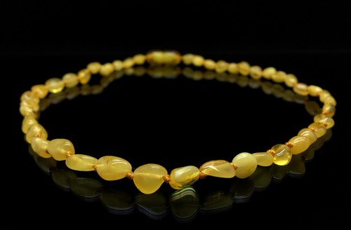 Collana ambra intagliata - , a