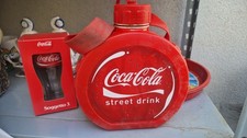 coca cola bottle and glass