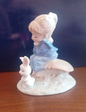 STATUINA SCULTURA Bimba Seduta