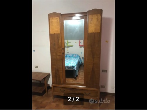 Armadio con specchio inizi