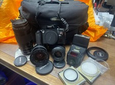 Canon EOS Rebel X-S, 3 lenses