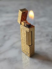 Accendino Dunhill placcato oro motivo Bark Swiss Made vintage anni ’70–’80